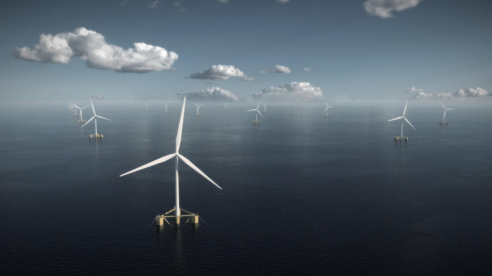 Imagen de varios aerogeneradores instalados en el mar.