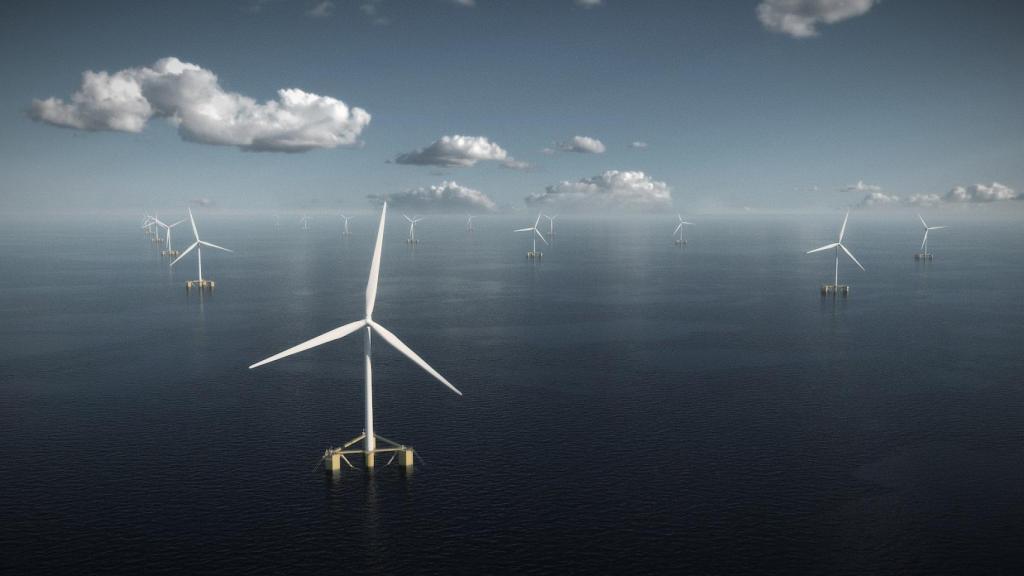 Imagen de varios aerogeneradores instalados en el mar.