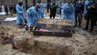 2022-09-16T133830Z_846752588_RC2CIW9FDUI7_RTRMADP_3_UKRAINE-CRISIS-IZIUM-EXHUMATIONS