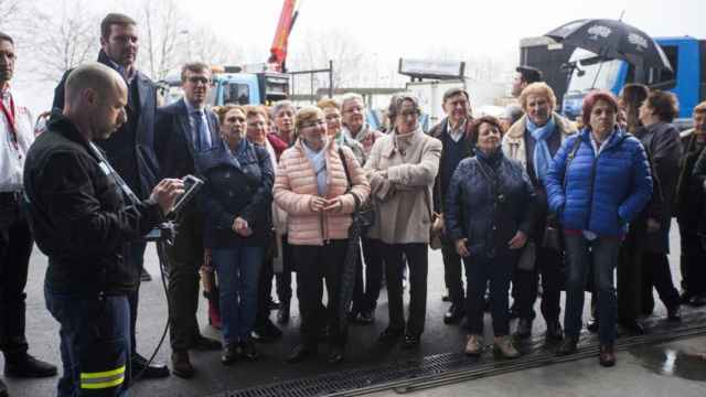 Manuel Silva, a la izquierda, en la Axega.