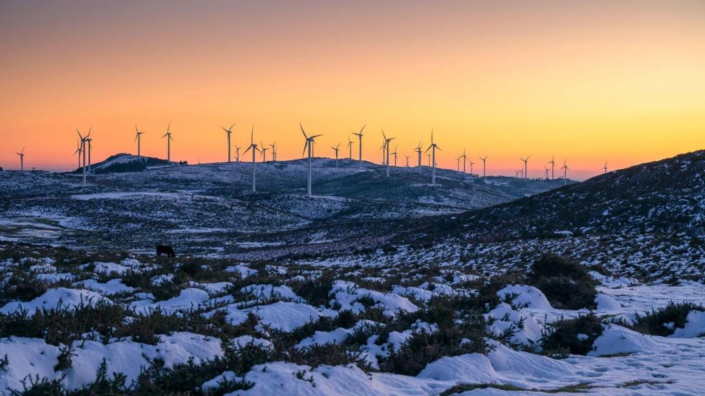 Winter sunset at the wind farm in the Serra do Cando mountains, in Pontevedra, Galicia, Spain