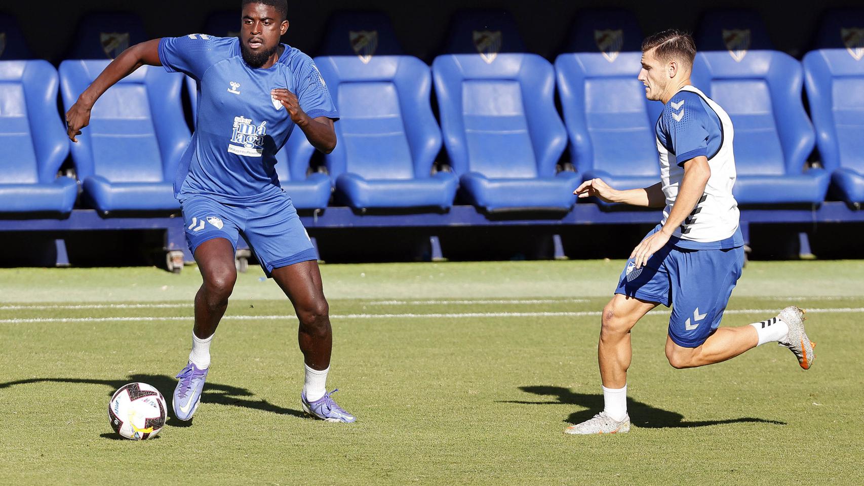 Alfred N'Diaye y Cristian durante un entrenamiento con el Málaga CF