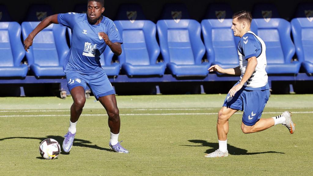 Alfred N'Diaye y Cristian durante un entrenamiento con el Málaga CF