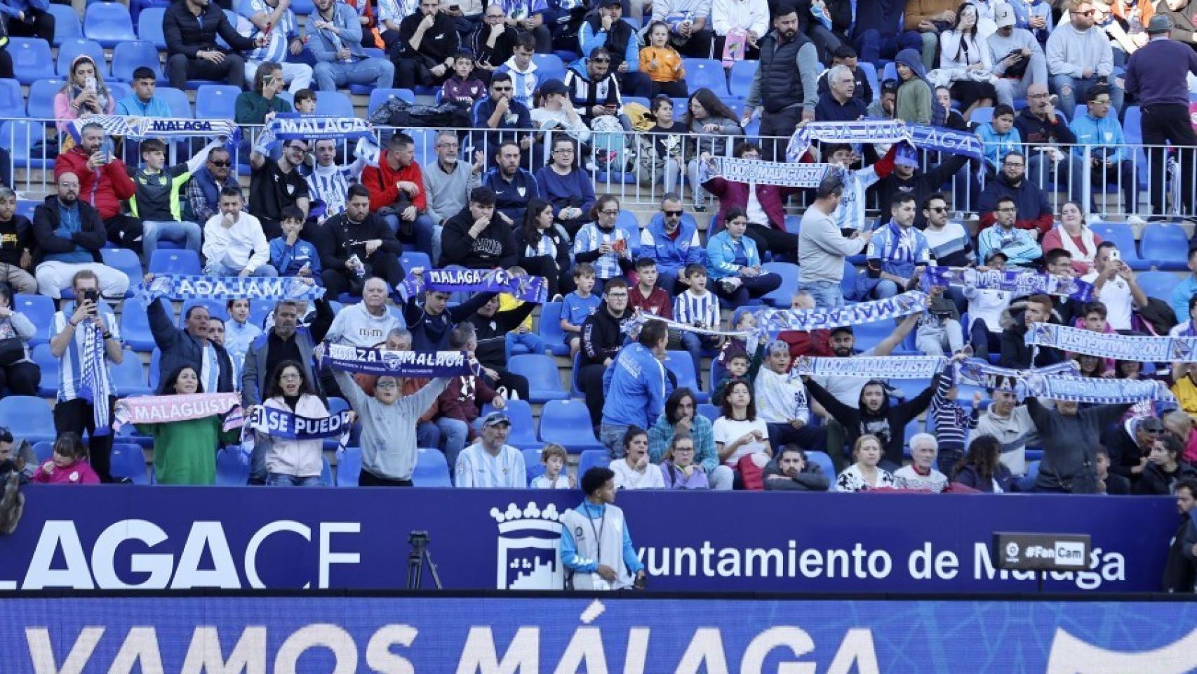La afición del Málaga durante un partido en La Rosaleda