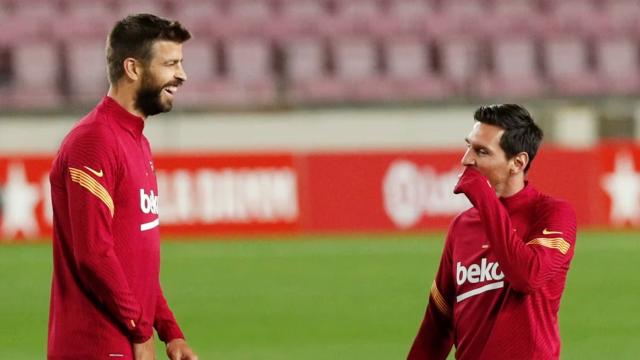 Piqué y Messi, entrenando con el Barça