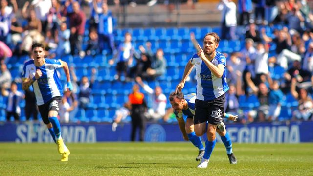 Míchel, derecha, analiza la situación del Hércules.