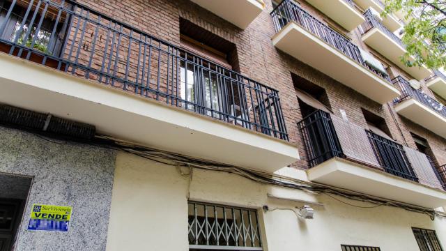 Un cartel de 'Vende' de una inmobiliaria.