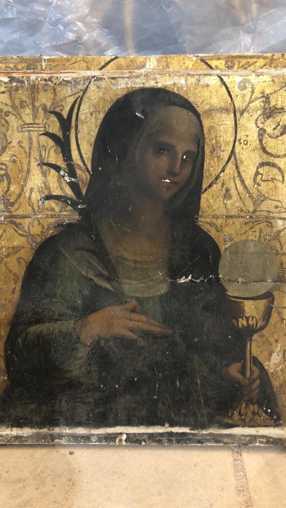 Tabla hallada en el retablo de Cedillo de la Torre