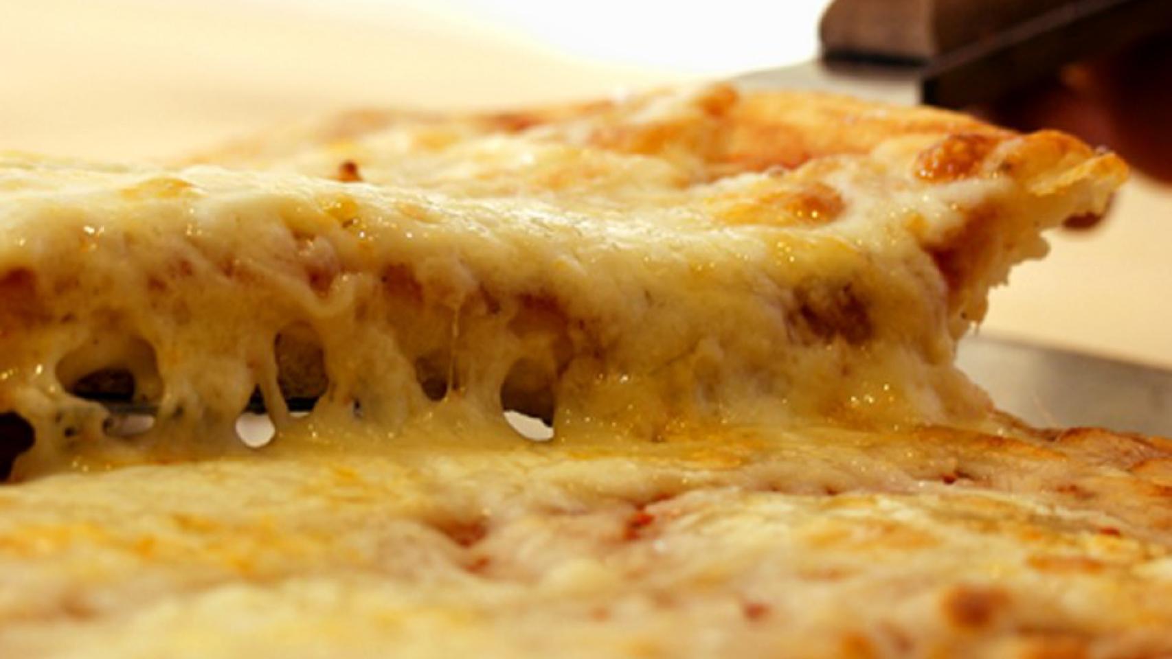 Queso de pizza.