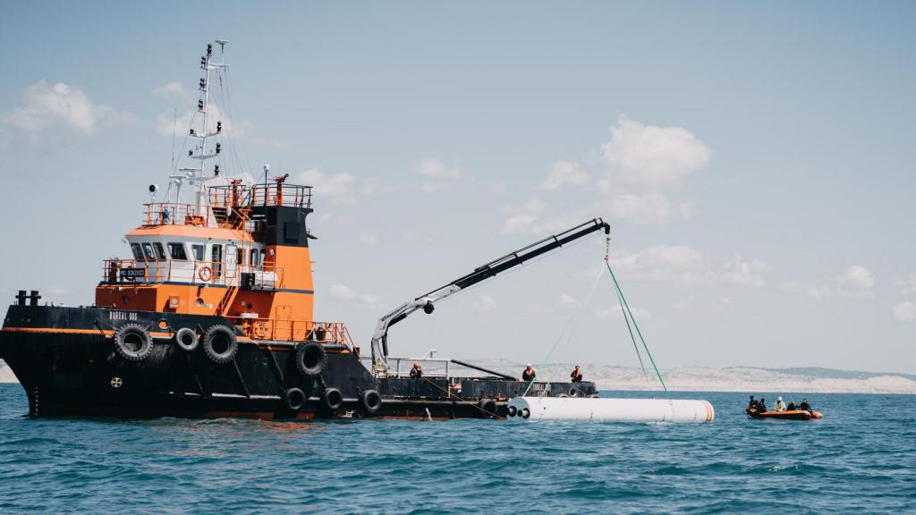 Ensayo de maniobra de recogida en barco
