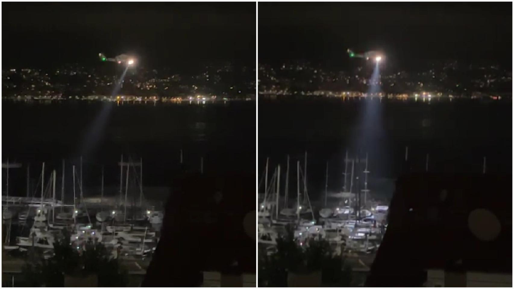Un helicóptero de rescate realiza tareas de búsqueda en el puerto de Vigo.