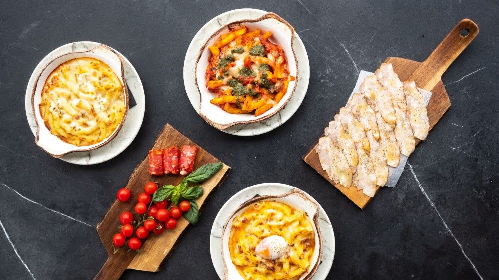 Las nuevas pastas gratinadas de Ditaly y el chicharrón de Cádiz presentes en su carta.