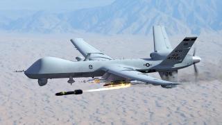 Dron Reaper lanzando un misil