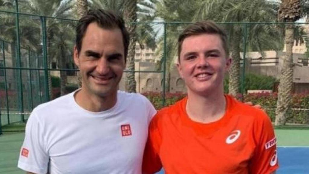 Federer y Stricker.