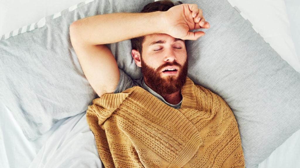 Imagen de archivo de un hombre de mediana edad durmiendo.
