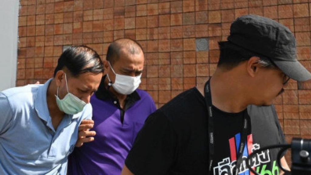 Songsak durante la detención.