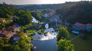 Ponte Maceira, Spain – May 24th 2023 – Aerial view at sunrise of the beautiful fairytale Spanish town of Ponte Maceira – Close to Santiago de Compostela