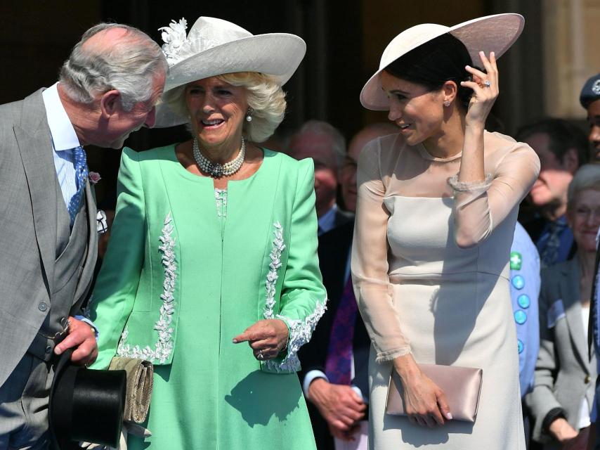 Carlos III y Camila junto a Meghan Markle, en una imagen de archivo.