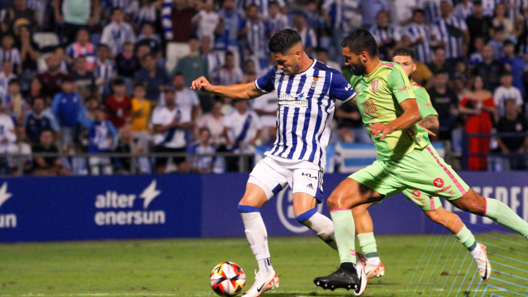 Caye Quintana y Einar Galilea durante el Recreativo de Huelva vs. Málaga CF