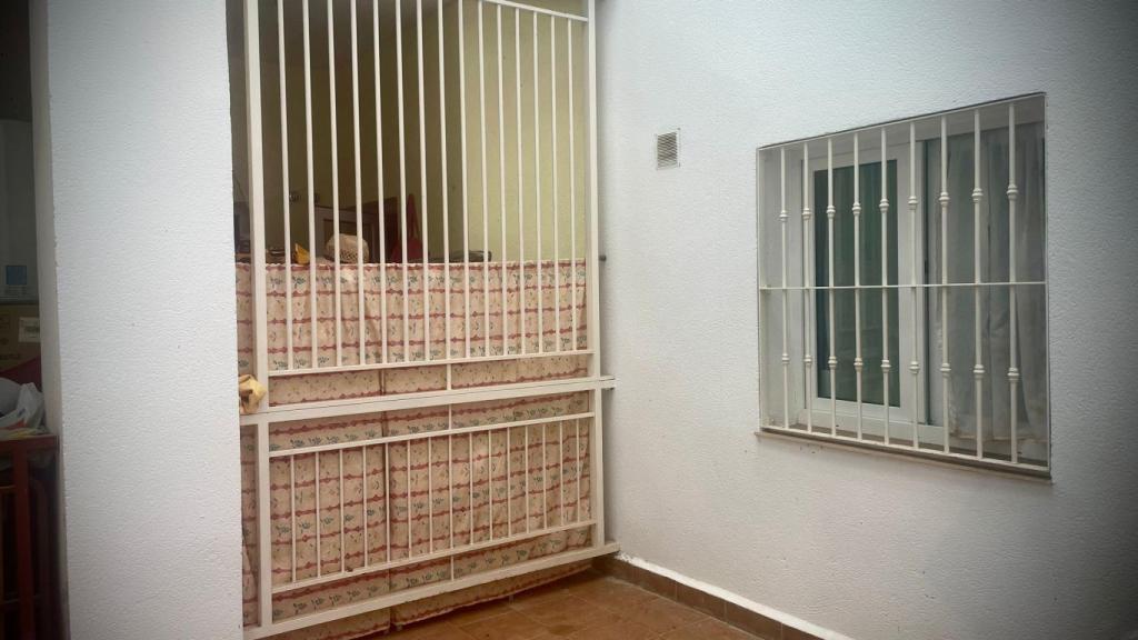 El patio de la casa donde vivían.