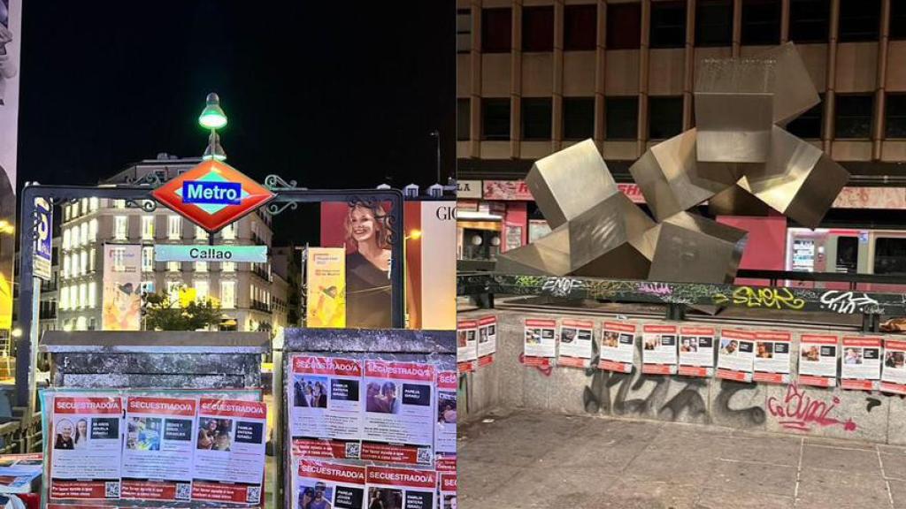 Decenas de carteles con las fotos de los secuestrados por Hamás cubren la saluda del metro de Callao en Madrid.