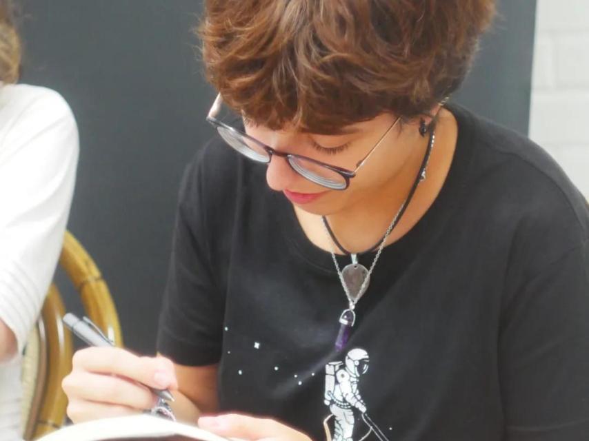 María en una firma de libros