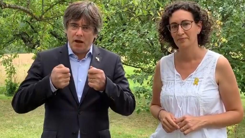 Carles Puigdemont y Marta Rovira (ERC), imputados por terrorismo en el 'caso Tsunami',  durante un encuentro de 2019.