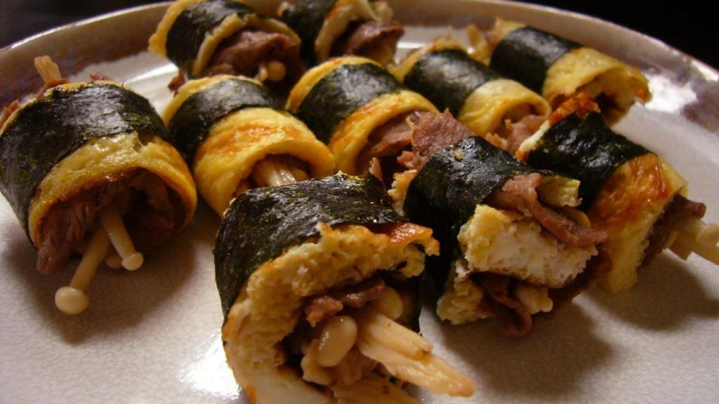 Receta de ternera, huevo y setas enoki.