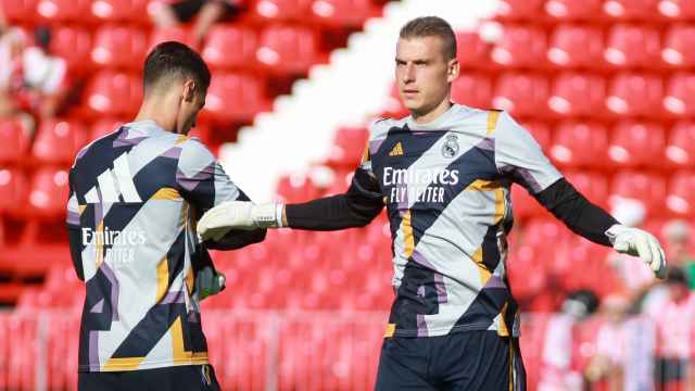 Kepa y Lunin, en un calentamiento del Real Madrid