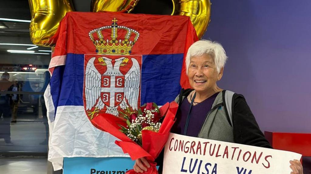 Luisa Yu en su recibimiento tras llegar al país 193.