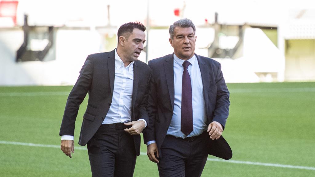 Xavi Hernández y Joan Laporta en una imagen de archivo.