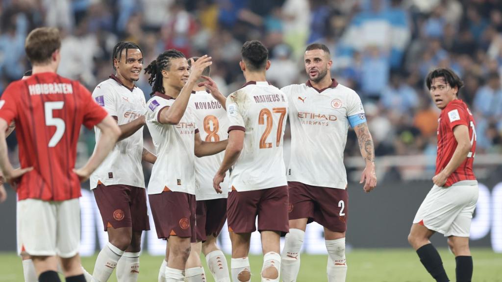 Los jugadores del Manchester City celebran un gol frente al Urawa Reds.