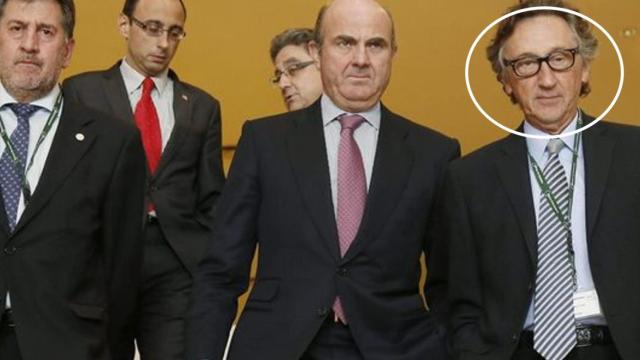 Artur Carulla junto al exministro de Economía, Luis de Guindos.
