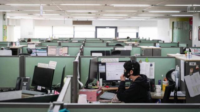 Imagen de archivo de unos trabajadores.