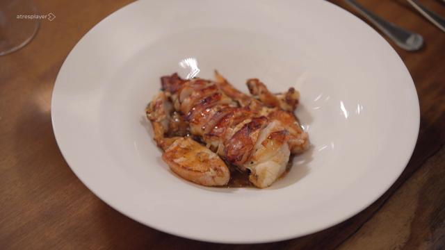 Bogante a la brasa con guiso de ternera.