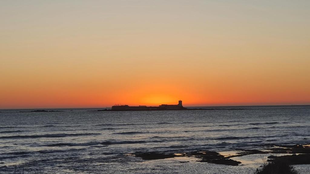 Puesta de sol desde una de las playas de Chiclana.