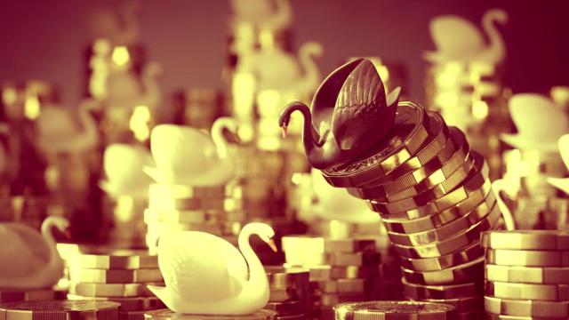 Un cisne negro y unos cisnes blancos sobre varias monedas.
