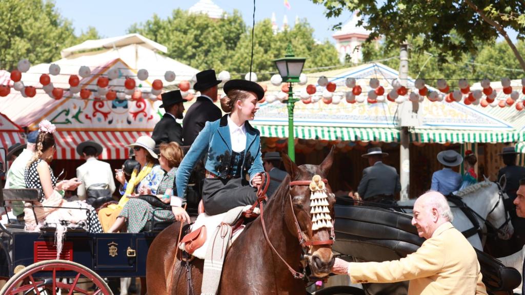 Caballistas en el Real de la Feria.