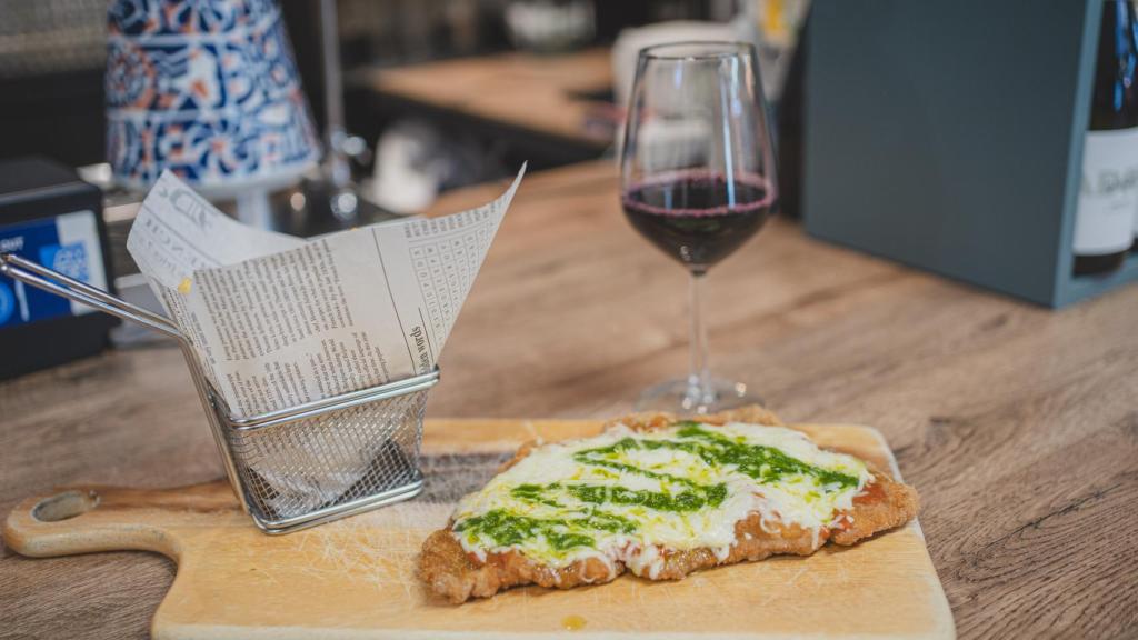 Milanesa tradicional napolitana.