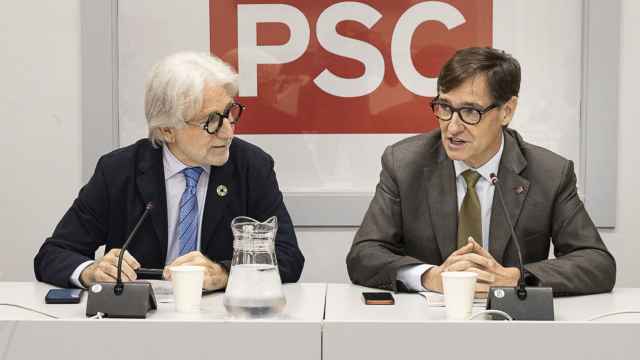 Josep Sánchez Llibre junto a Salvador Illa.
