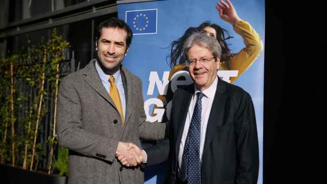 Carlos Cuerpo, ministro de Economía, Comercio y Empresas, y Paolo Gentiloni, comisario de Economía de la Comisión Europea en un acto en Madrid.