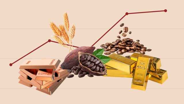Diferentes materias primas sobre un gráfico al alza.