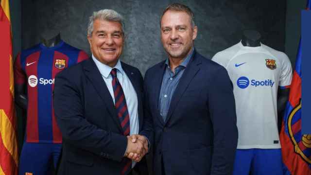 Joan Laporta y Hansi Flick tras cerrar el acuerdo