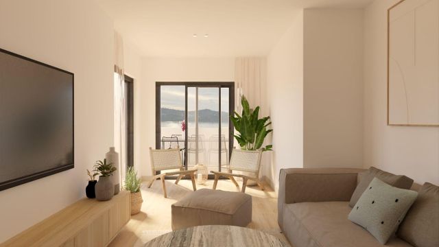 Salón de una vivienda de Residencial La Barrosa.