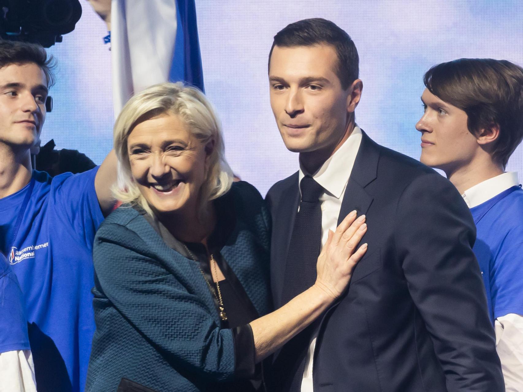 Marine Le Pen y Jordan Bardella, en un acto a inicios de junio