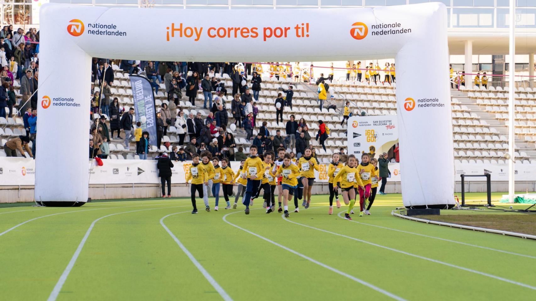 Niños participando en la décima edición de la Nationale-Nederlanden San Silvestre Vallecana Mini
