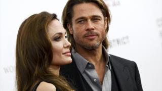 Angelina Jolie y Brad Pitt durante la promoción de una película.