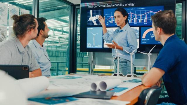 Fotografía de un equipo reunido.