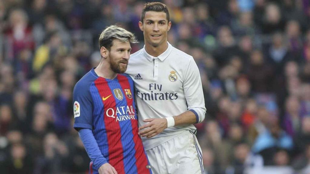 Messi y Cristiano Ronaldo, durante un partido.