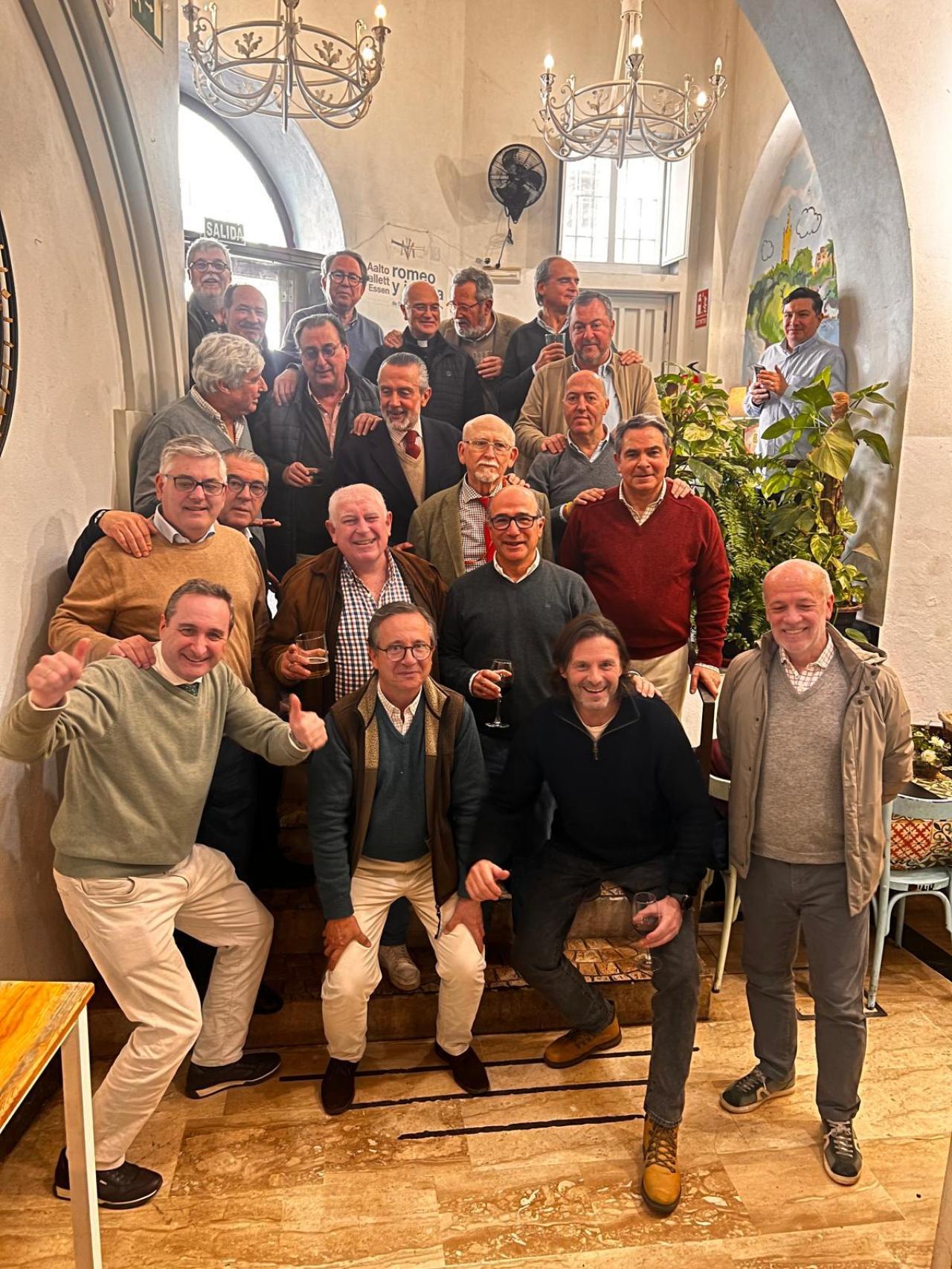 Sus alumnos y compañeros.